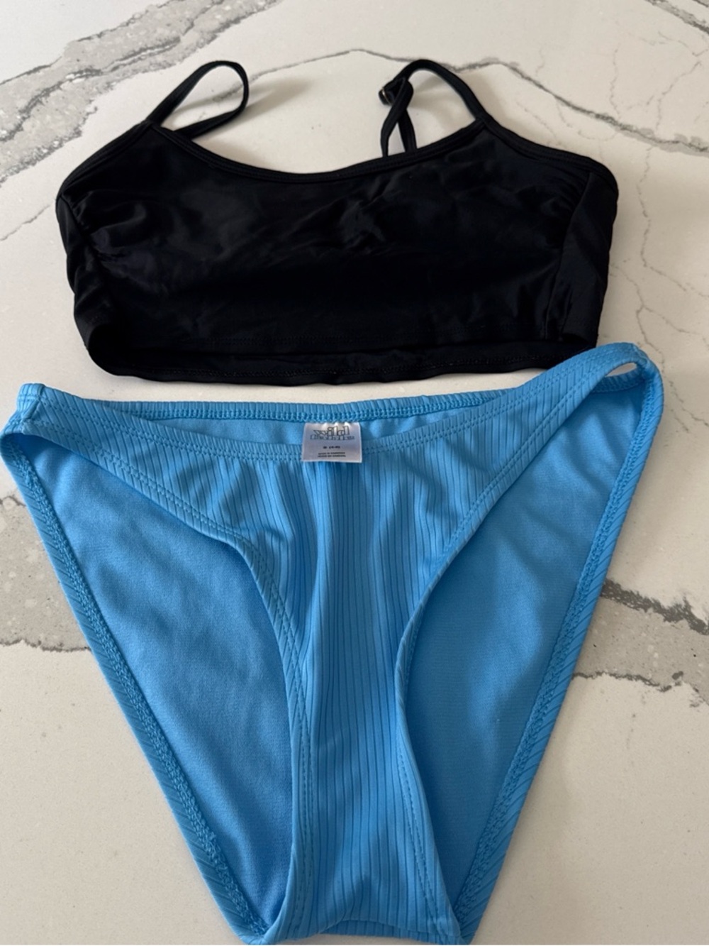 Black Bikini Top with Light Blue Ribbed Bikini Bottom